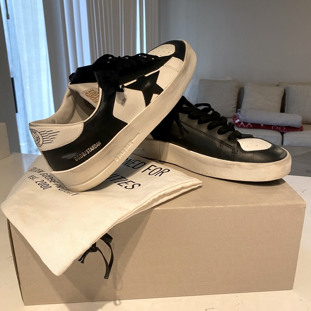 Brand new, never worn mens Golden Goose sneakers. They are a size 9.5